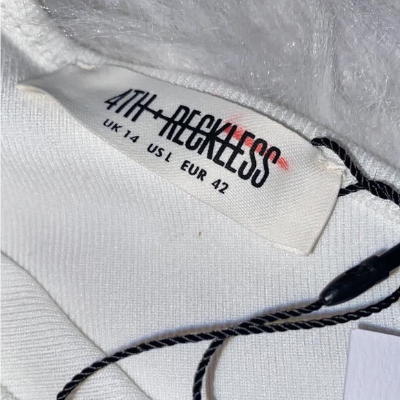 OFF WHITE SLEEVELESS RIBBED BODYSUIT - Picture 2 of 8